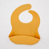 Silicone feeder bib in sunshine with catcher