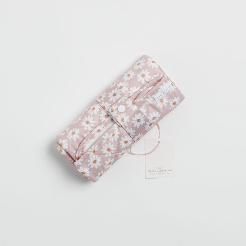 Reusable change mat in a soft lilac based daisy print. Luxe quilted finish with a soft bamboo terry, machine washable, perfectly paired with modern cloth nappies, bee details on snaps. 