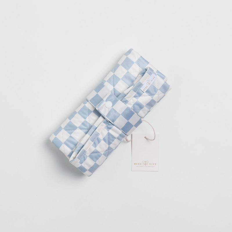 Reusable change mat in a blue and white check. Luxe quilted finish with a soft bamboo terry, machine washable, perfectly paired with modern cloth nappies, bee details on snaps. 